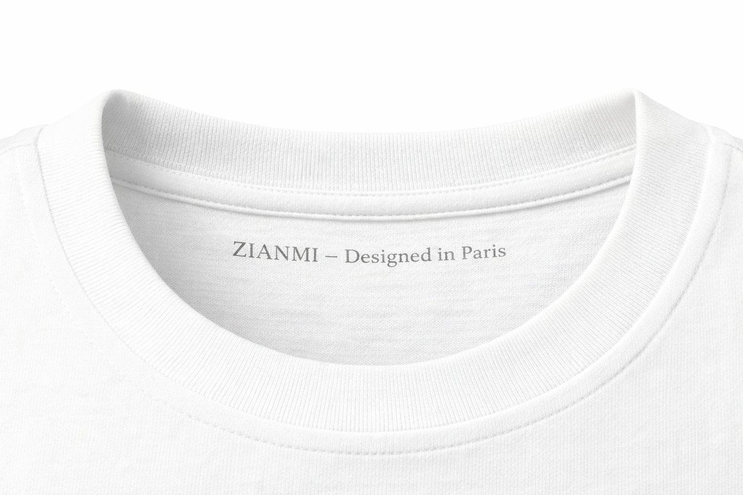 Close-up of a white t-shirt collar with 'ZIANMI - Designed in Paris' text.