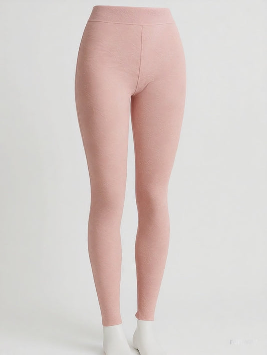 “5-second 360-degree product video of dusty rose floral leggings on a mannequin, showing front, side, and back views against a white studio background.”